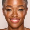 UNREAL SKIN SHEER GLOW TINT FUKTGIVENDE FOUNDATION-STICK 12,5 TAN