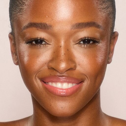 UNREAL SKIN SHEER GLOW TINT FUKTGIVENDE FOUNDATION-STICK 12,5 TAN