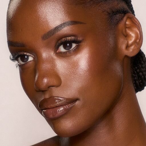 UNREAL SKIN SHEER GLOW TINT FUKTGIVENDE FOUNDATION-STICK 14 DEEP