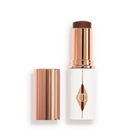 UNREAL SKIN SHEER GLOW TINT FUKTGIVENDE FOUNDATION-STICK 16 DEEP