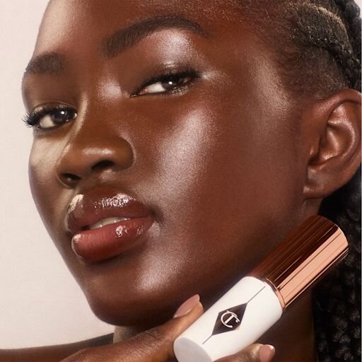 UNREAL SKIN SHEER GLOW TINT FUKTGIVENDE FOUNDATION-STICK 16 DEEP
