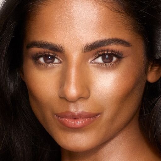 UNREAL SKIN SHEER GLOW TINT HYDRATING FOUNDATION STICK 9 TAN